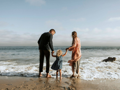 pexels - photo-of-family-on-seashore-1574653